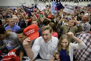 Supporter cheer as Republican presidential candidate Donald Trump speaks during a rally, Friday, May 27, 2016 in San Diego.