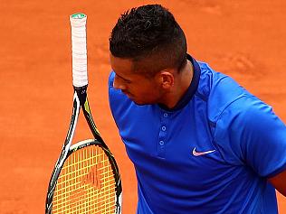 PARIS, FRANCE - MAY 27: A dejected Nick Kyrgios of Australia reacts during the Men's Singles third round match against Richard Gasquet of France on day six of the 2016 French Open at Roland Garros on May 27, 2016 in Paris, France. (Photo by Clive Brunskill/Getty Images)