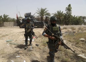 Iraqi federal police at the front line during fight against Islamic State outside Fallujah, Iraq, Saturday, May 28, 2016.