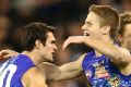 Bulldogs celebrate a big win over Collingwood.