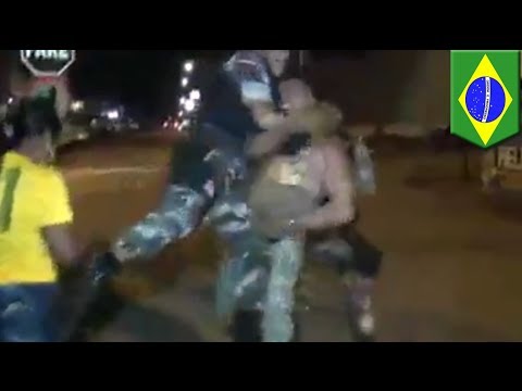 Brazilian police beat up man who wiped out on motorcycle