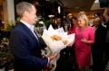 Bill Shorten buys orange Colombian roses for his wife Chloe during a street walk at Westfield in Brisbane.