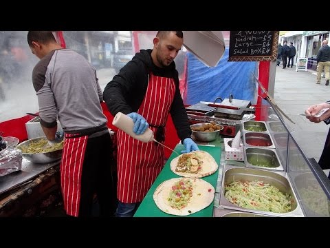 Fast Falafel Wrap maker at "Veg-as-You-Go": Jordan Street Food Stall at Lower Marsh Market, London.