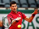 Novak Djokovic hits a forehand during the match against Roberto Bautista Agut on day eleven of the 2016 French Open at Roland Garros on Wednesday. Photo: Clive Brunskill