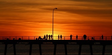 A friday night on Derby Wharf, WA. A sunset in July. Fisherfolk, grey nomads, kid's on bikes, blokes having a beer. I ...