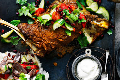 Slow-cooked lamb shoulder with tahini yoghurt.