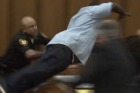 Courtroom footage shows Van Terry diving towards his daughter's killer, Michael Madison.