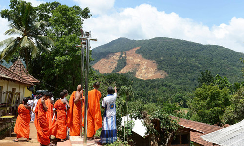 Sri Lanka gives up hope for 100 lost in landslide, monks hold prayers for victims