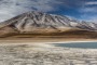 Mountains and volcanoes provide an impressive backdrop to Laguna Verde (Green Lagoon) in Bolivia's Eduardo Avaroa Reserve.