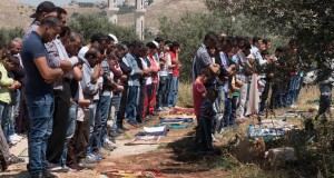 Prayers take place before the protest in Ni'lin