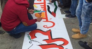 Palestinians drawing murals
Photo credit: Youth Against Settlements