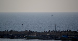 An Israeli gunship cruises near the Gaza seaport. (Photo by Rosa Schiano)