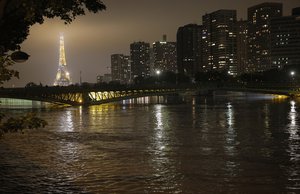 View of the flooded banks of the river Seine in front of the Eiffel tower in Paris, Friday, June 3, 2016.