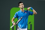 Novak Djokovic (SRB) competes against Kyle Edmund (GBR) at the 2016 Miami Open presented by Itau in Key Biscayne, Florida. Photographer Aaron Gilbert