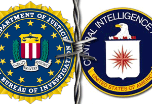 Image of FBI & CIA shield behind barbed wire