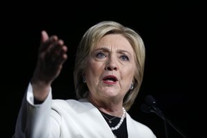 Democratic presidential candidate Hillary Clinton addresses supporters at her Super Tuesday election night rally in Miami, Tuesday, March 1, 2016.