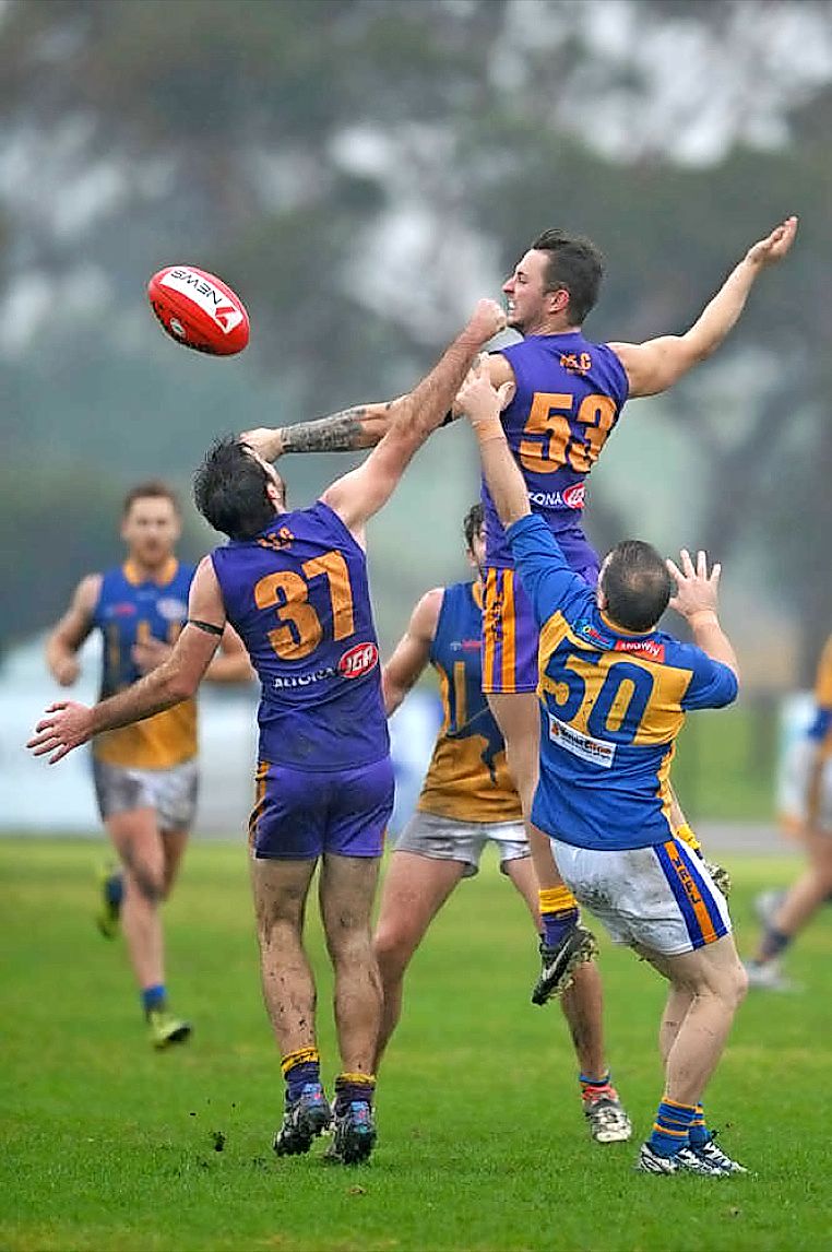 Brent O’Leary soars into the air for Altona against Sunshine Kangaroos. Picture Damian Visentini