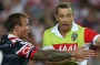 Back in charge: Jake Friend speaks to referee Ben Cummins during the Anzac Day clash.