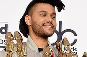 Canadian singer The Weeknd won eight gongs at the 2016 Billboard Music Awards, a new record for any male recording artist.