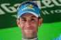 Italian rider Vincenzo Vincenzo Nibali celebrates on the podium after winning the 19th stage of the Giro d'Italia.