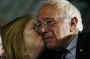 Bernie Sanders gets a kiss from his wife, Jane O'Meara Sanders, at a rally on Tuesday.