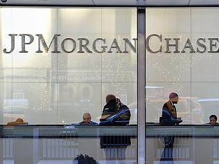 JPMorgan earnings dip as trading slumps