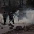 A Palestinian ambulance covered in tear gas shot by Israeli forces
Photo credit: Kafr Qaddum demonstration