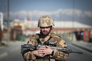 File - A coalition forces member participates in the annual remembrance ruck, run and walk event in Kabul, Afghanistan, April 27, 2016.  The ruck, run and walk honored the nine Airmen who were shot and killed on the Afghan Air Force base on April 27, 2011.