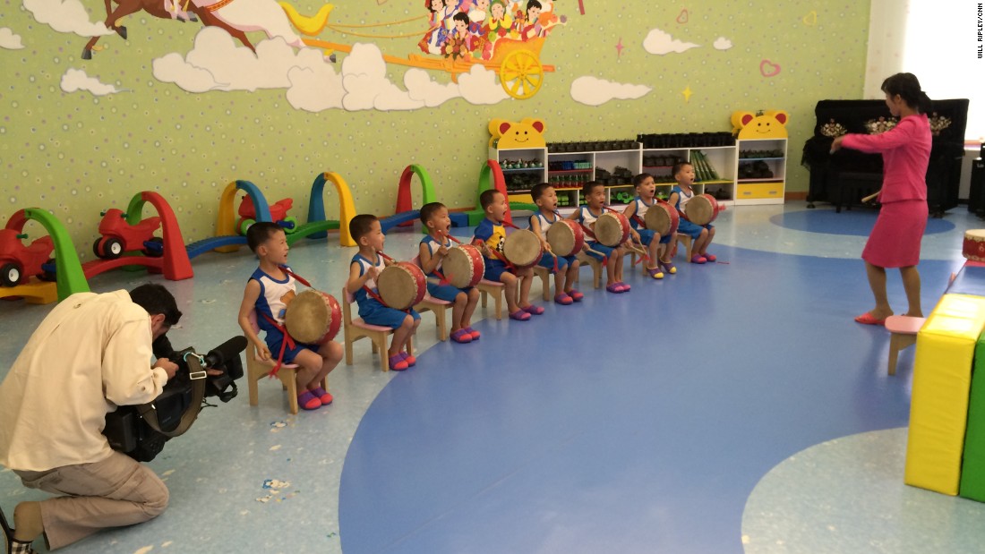 Young boys practice a drum routine that they will perform during International Children&#39;s Day in June.