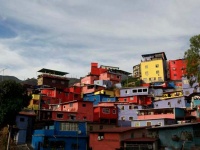 A barrio (informally constructed urban community) in Caracas, with the buildings painted under the urban regeneration social pro