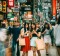 Japanese girls hanging out on Shibuya streets of Tokyo. 