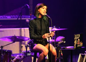 In this March 2, 2016 file photo, Christina Grimmie performs as the opener for Rachel Platten at Center Stage Theater, in Atlanta. Florida authorities say "The Voice" star Grimmie is in critical condition after being shot at a concert venue in Orlando by a suspect who then fatally shot himself after being tackled by the singer-songwriter’s brother