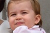 Catherine, Duchess of Cambridge holds daughters Princess Charlotte of Cambridge  in her first appearance on the palace ...