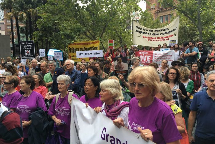 Hundreds of protesters rally outside the Department for Immigration in Sydney.