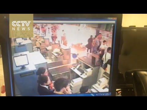 Footage: Passengers scatter as explosion rocks Shanghai Pudong Airport