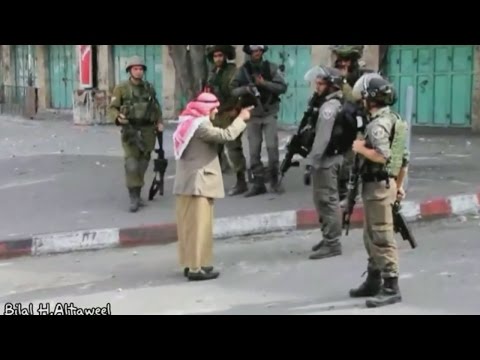 Elderly Palestinian man confronts armed Israeli soldiers before collapsing