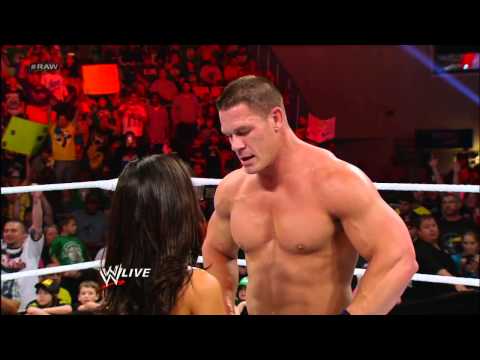 John Cena and AJ Lee kiss after Cena's victory over Dolph Ziggler: Raw, Nov. 26, 2012