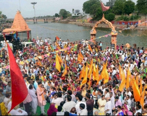 Devotees take part in Kshipra Teerth Parikrama on the banks of holy river Kshipra...