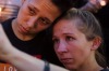 Jennifer, right, and Mary Ware light candles during a vigil downtown for the victims of a mass shooting at the Pulse ...