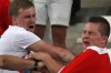 Russian supporters attack an England fan at the end of the Euro 2016 group match between England and Russia, at the ...