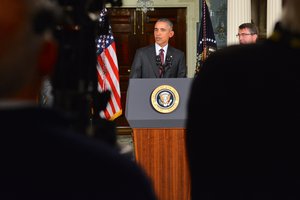 File - President Barack Obama delivers a statement on the global campaign to degrade and destroy ISIL, as well as Syria and other regional issues, at the U.S. Department of State in Washington, D.C., on February 25, 2016.