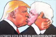 A mural that has been painted on a derelict building in Stokes Croft showing Donald Trump sharing a kiss with Boris Johnson.