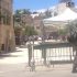 Palestinians praying outside Ibrahimi mosque