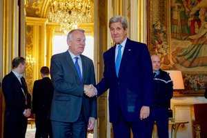 U.S. Secretary of State John Kerry Shakes Hands With French Foreign Minister Jean-Marc Ayrault during First Meeting at Quai d'Orsay in Paris, France