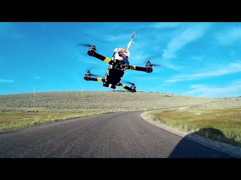 FPV Drone Racing from Moving Car