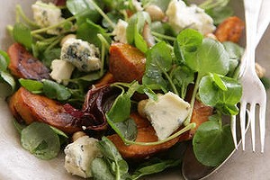 Warm salad of blue cheese with sweet potato, hazelnuts and watercress.