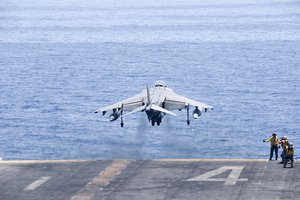 An AV-8B Harrier II assigned to the 13th Marine Expeditionary Unit launches from the amphibious assault ship USS Boxer to conduct missions in support of Operation Inherent Resolve, against ISIS, Arabian Gulf, 16 June, 2016.