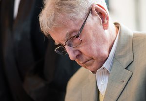 94-year-old former SS guard at the Auschwitz death camp Reinhold Hanning waits for the start of his trial in Detmold, Germany, Thursday, Feb. 18, 2016.