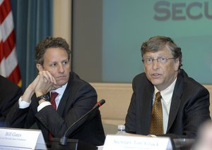 File - Treasury Secretary Timothy Geithner and Bill Gates, Co-chair of the Bill & Melinda Gates Foundation, meeting about a new international commitment to fight global hunger and poverty at Treasury Department April 22, 2010.