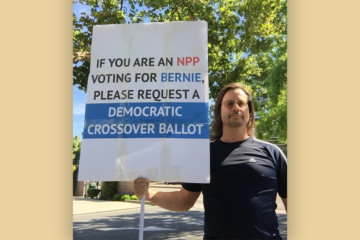 Eric Reynolds, a pledged delegate for Sanders, stood outside a polling place in Walnut Creek in Contra Costa County.